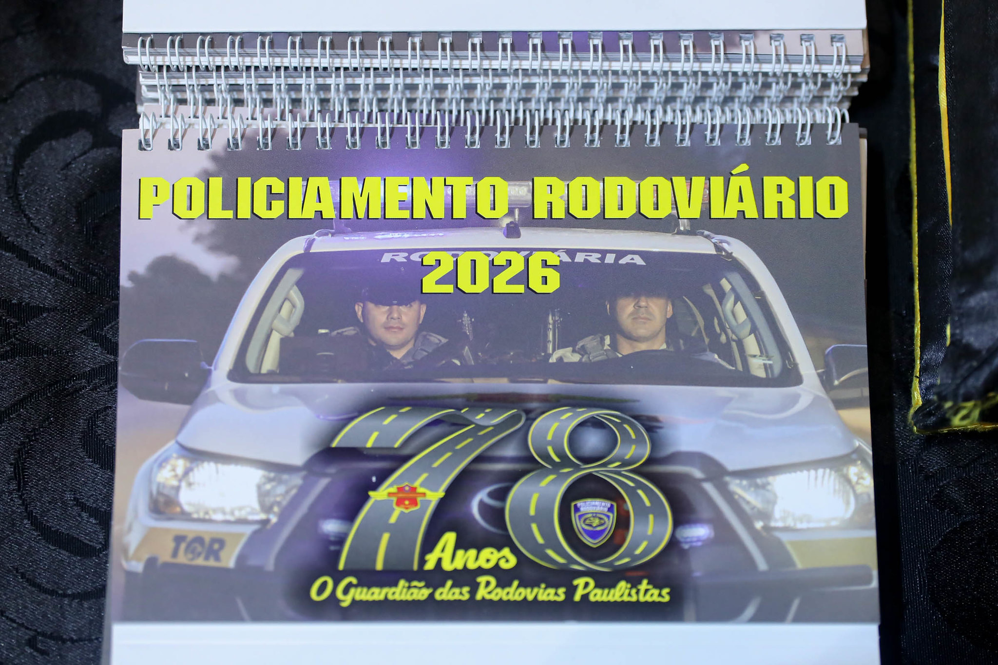 Calend�rio 2026 do Policiamento Rodovi�rio<a style='float:right;color:#ccc' href='https://www3.al.sp.gov.br/repositorio/noticia/N-12-2025/fg357769.jpg' target=_blank><i class='bi bi-zoom-in'></i> Clique para ver a imagem </a>